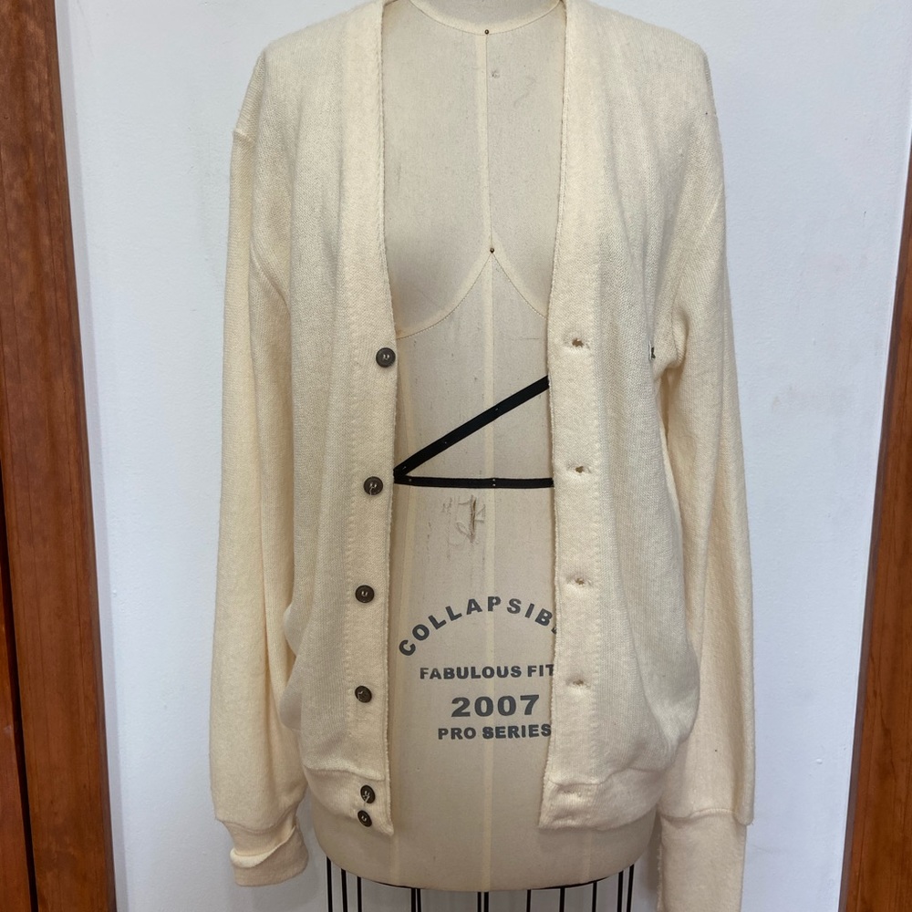 White Lacoste sweater